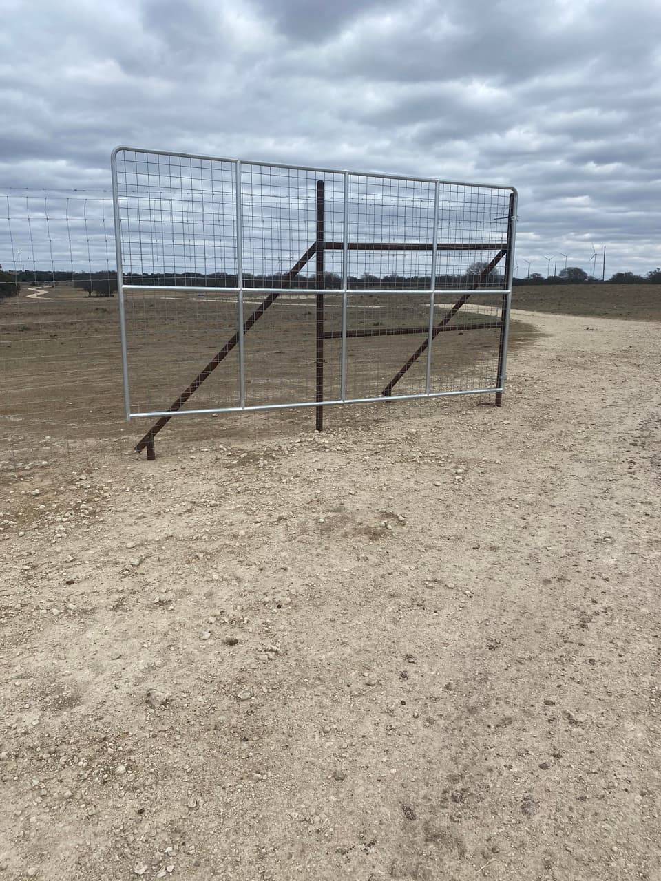 Game Fencing & Wildlife Exclusion example — Net-wire game fence & gate, Meridian area